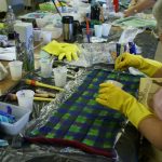 hand dyeing a blank canvas sock blank at a workshop with debbie tomkies of dt craft and design